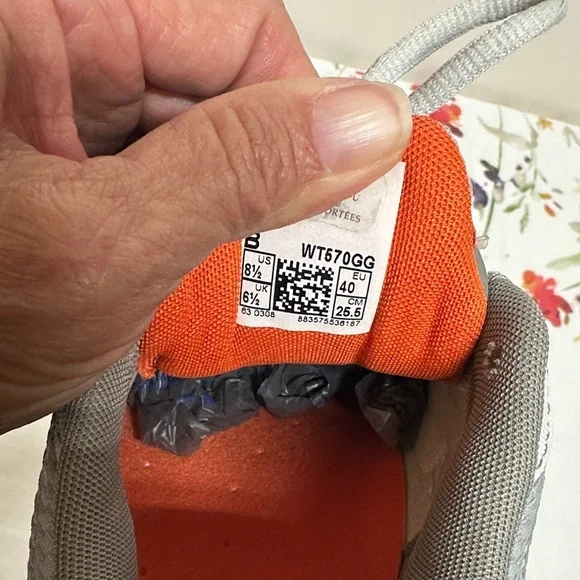 New Balance Light Gray with Orange Accents Sneakers - Picture 13 of 13